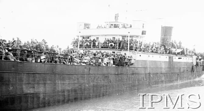 Overcrowded ship arriving at Pahlevi in 1942. Could be The Zhdanov